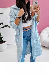 Detail of light blue hooded knit cardigan with diamond waffle texture and front pockets