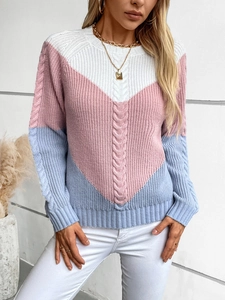 Women's cable knit sweater with color-block V-pattern in pink, blue, and white tones
