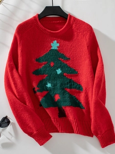 Detailed view of red Christmas tree knit sweater featuring rib-knit cuffs and crew neckline