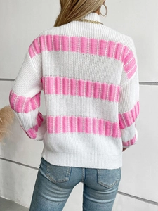 Women's pink striped knit sweater with loose fit and mock neck, back view on model