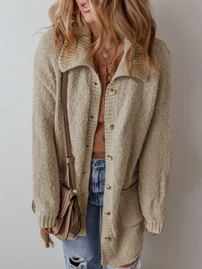 Oversized beige knit cardigan for women featuring a wide collar and front patch pockets