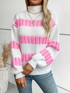 Close-up of pink and white striped knit sweater with mock neck and textured fabric