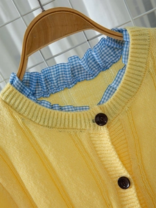 Slim fit yellow knit cardigan with ruffled blue plaid collar and dark buttons
