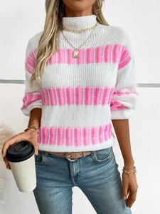 Detail of white and pink striped knit sweater with high neck and relaxed shoulder design