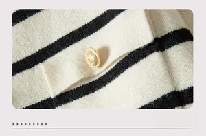Close-up of knit fabric texture with striped pattern and gold embossed button detail
