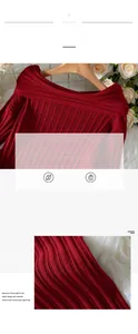 Detailed close-up of soft red ribbed knit sweater fabric and elegant neckline texture