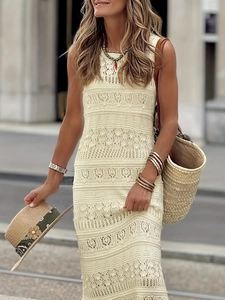 Elegant sleeveless crochet knit maxi dress in beige featuring intricate openwork patterns