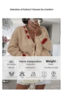 Detail showing red heart patterns and tie-front closure on beige knitted cardigan