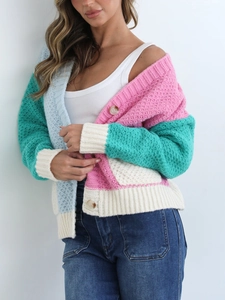 Chunky knit color-block cardigan with pastel panels and oversized amber buttons