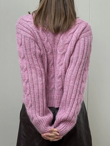 Women's peach pink cable knit sweater in loose fit with premium wool texture finish