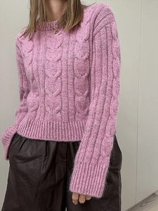 Pink cable knit sweater for women featuring casual loose fit and stylish crew neck design