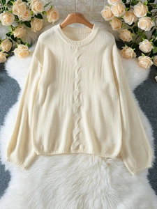 Women's cream white cable knit sweater with classic crew neck and long sleeves