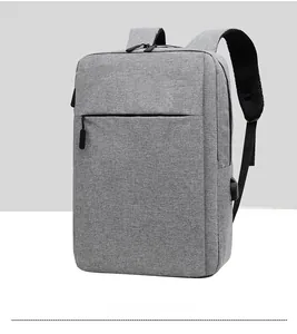 Detail view of grey business backpack with side USB port and cushioned straps