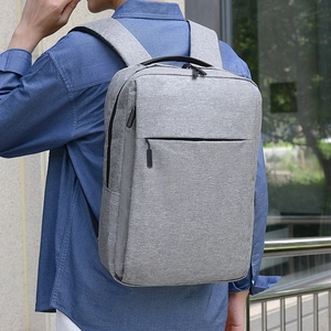 Minimalist grey business backpack with large capacity for laptop and travel usage