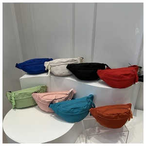 Detailed group view of multi-color nylon fanny packs with woven zipper pulls