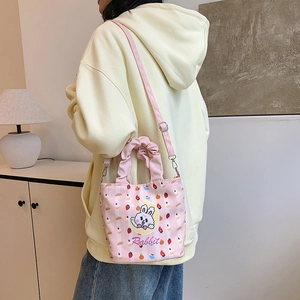 Pink canvas bucket bag with cute rabbit pattern and soft pleated handle for women