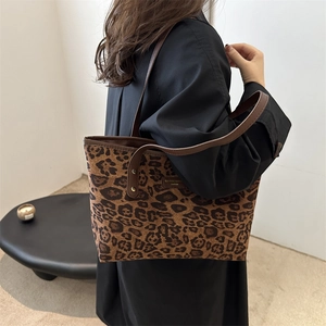 Retro leopard print tote bag with brown straps and spacious interior for daily commute