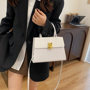 White vintage crossbody bag with crocodile texture and geometric gold buckle for women