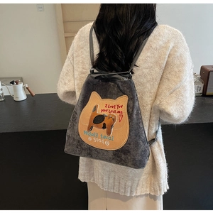 Detail of gray corduroy backpack with cat embroidery and I Love You text detail