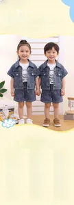 Close-up of kids denim 3-piece set with jacquard patterns and breathable cotton fabric