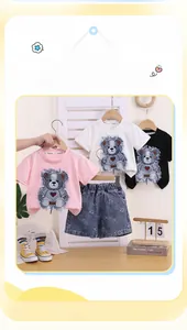Detail of girls summer set showing cute teddy bear embroidery and denim shorts print