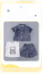 Flat lay of kids summer set with bear pattern denim shirt, white tee and matching shorts