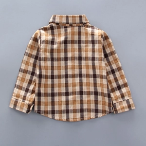 Detail view of the back of a brown plaid long-sleeved shirt with a neat collar design