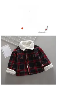 Close-up of children's plaid jacket featuring warm fleece lining and button details