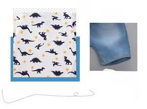 Detail of white cotton t-shirt with navy dinosaur prints and light blue denim shorts