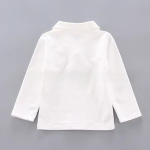 Close-up of white cotton long-sleeve polo shirt with classic collar and fine stitching