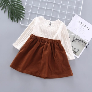 Girls long-sleeve knit patchwork dress in brown and white with pleated waist