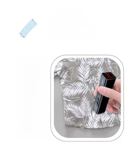 Detail showing non-fluorescent testing on palm leaf shirt with a safe 0.00 reading