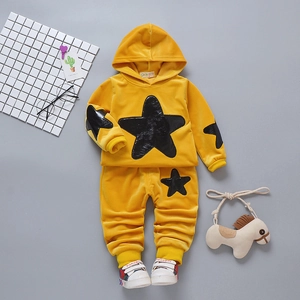 Yellow velvet hooded sweatshirt set for girls featuring black star patches and matching pants
