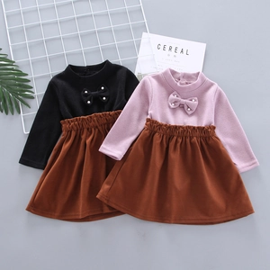 Girls' knit sweater and pleated skirt set with pearl bow detail in pink and black