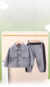 Detail of kids tweed gray plaid jacket and matching jogger pants two-piece outfit