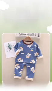 Detail of warm blue kids thermal underwear with soft fleece lining and cartoon bear pattern