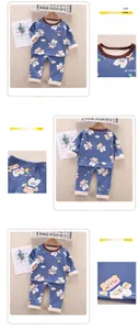 Detail view of children's thermal pajamas with warm fleece lining and astronaut bear print