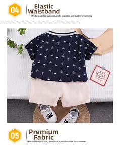 Detail of baby boys navy palm tree t-shirt and pink shorts with elastic waistband