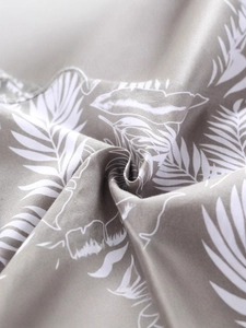 Boys short sleeve shirt set featuring grey tropical leaf print fabric texture