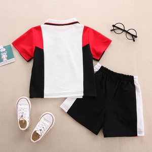 Kids color-block polo shirt and shorts set featuring red, white, and black sporty design