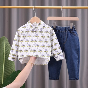Toddler boys two-piece set featuring printed long sleeve shirt and dark denim pants