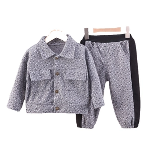 Kids houndstooth casual two-piece set featuring a button-up jacket and matching trousers