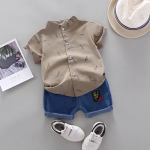 Kids summer outfit with khaki pencil print polo shirt and blue denim shorts set