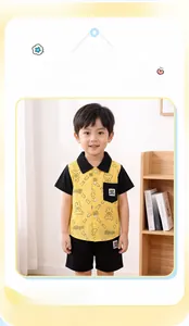 Close-up of yellow bear print short-sleeve shirt with matching black casual cotton shorts