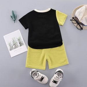 Boys summer two-piece outfit with color-block t-shirt and neon green shorts