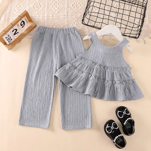 Girl's summer two-piece set with sleeveless ruffled top and wide-leg trousers in light blue