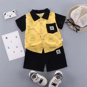 Boys summer two-piece outfit with yellow cartoon bear short sleeve shirt and black shorts