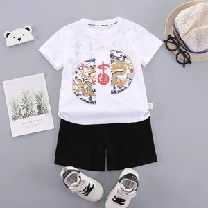 Boy's traditional Chinese hanfu set with white dragon print top and black shorts