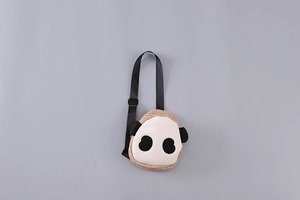 Close-up of a cute panda crossbody bag with check patterns and adjustable nylon strap