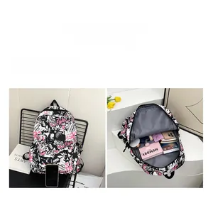Detail view of large graffiti backpack interior showing high capacity for laptops